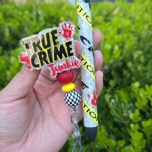 True Crime Junkie Badge reel and Pen Set